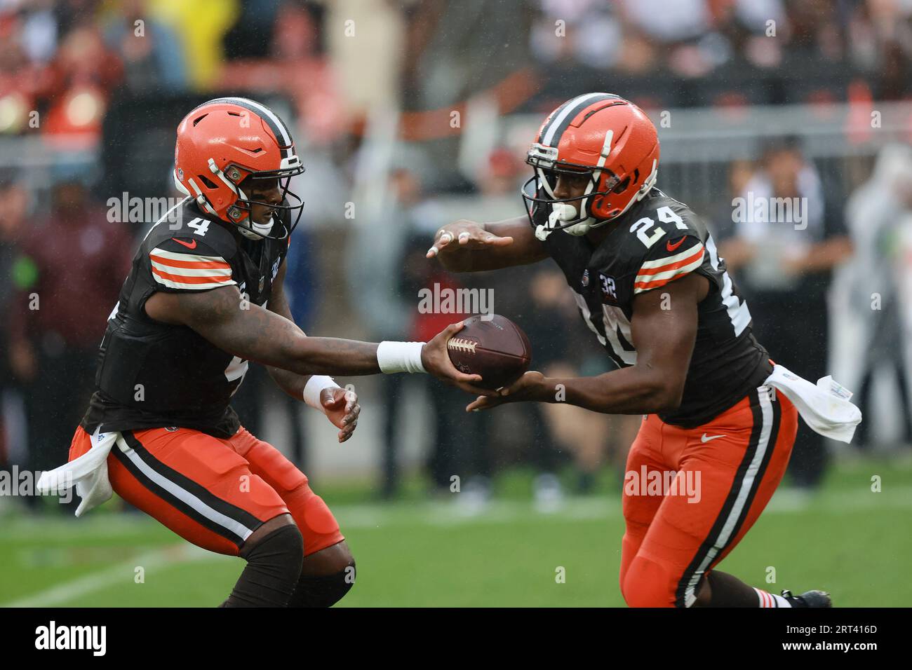 Bulldogs in the NFL - Image 34: Cleveland Browns running back Nick Chubb  (left) and his cousin Denver Broncos outside linebacker Bradley Chubb  (right) exchange jerseys following the game at Broncos Stadium