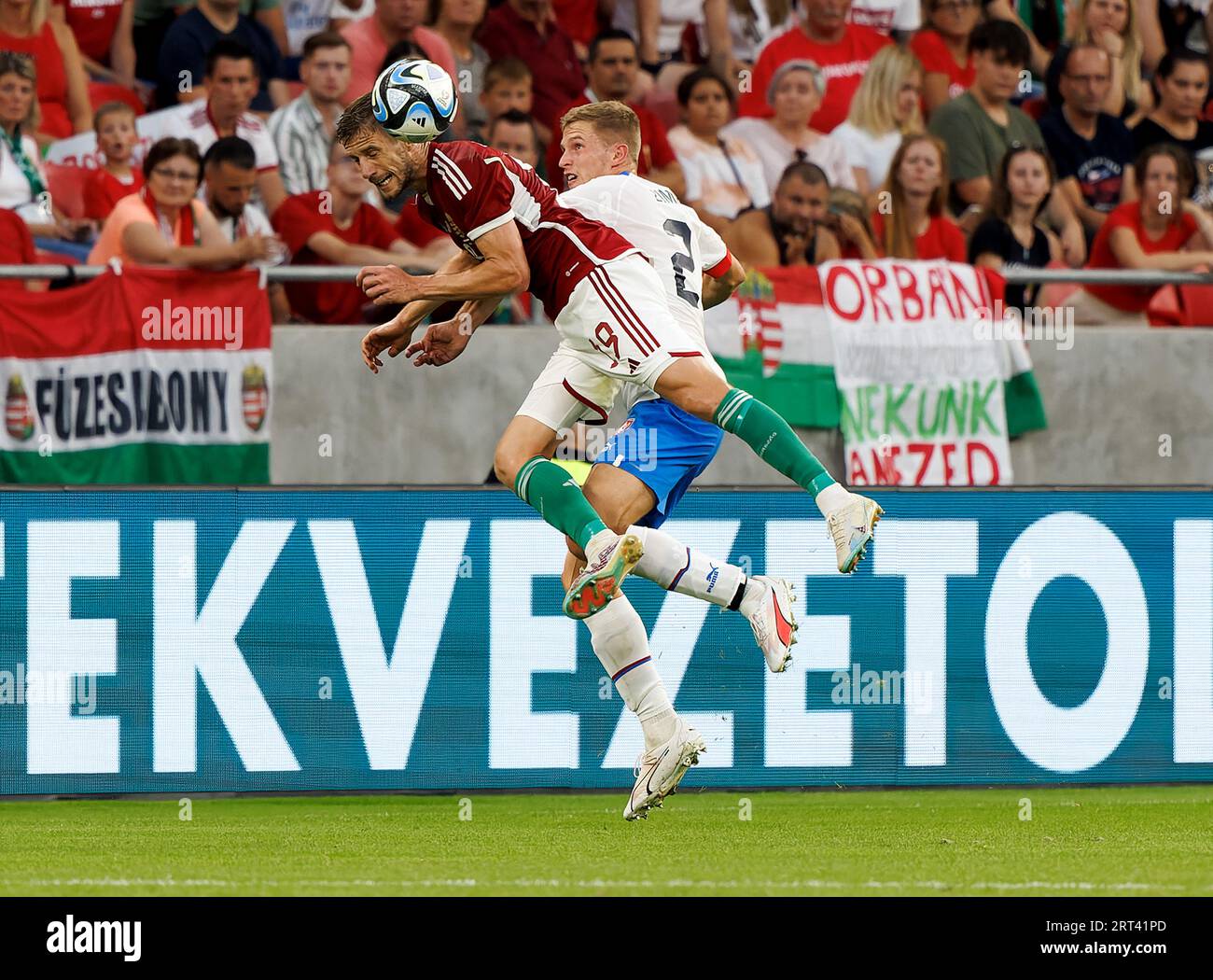 Barnabas Varga of Ferencvarosi TC shoots on goal beside Marcelina News  Photo - Getty Images