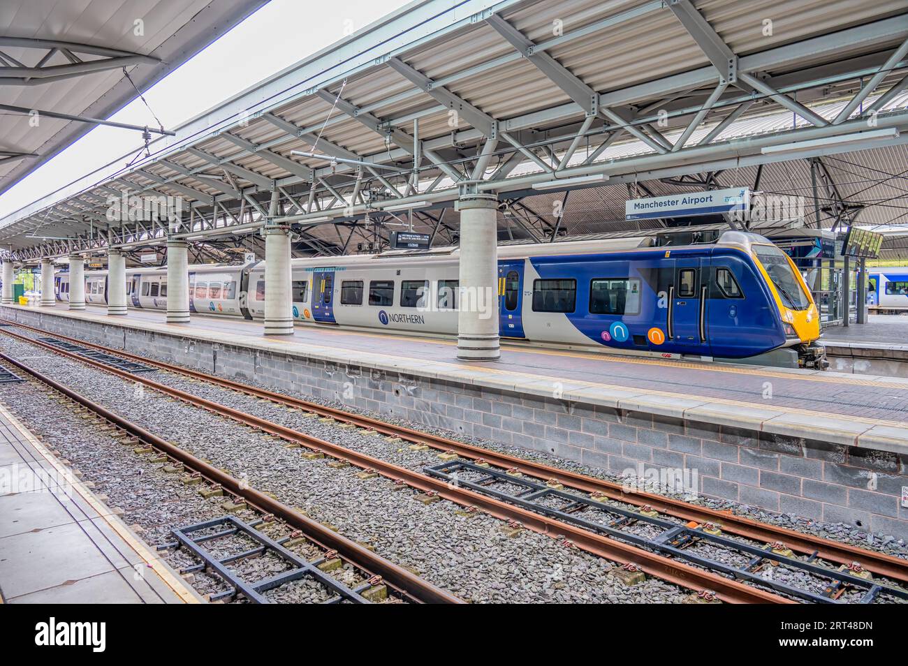 MANCHESTER, UK AUGUST 27, 2023 Northern train at a platform at Manchester Airport Stock Photo