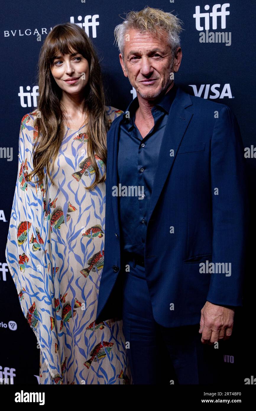 Dakota Johnson, left and Sean Penn attend the premiere of "Daddio" at