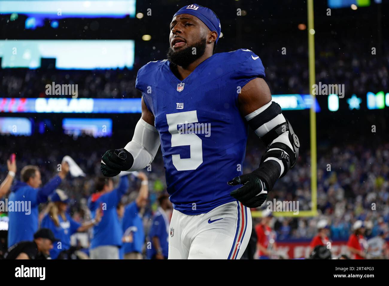 New York Giants' Kayvon Thibodeaux arrives on the field before an NFL ...