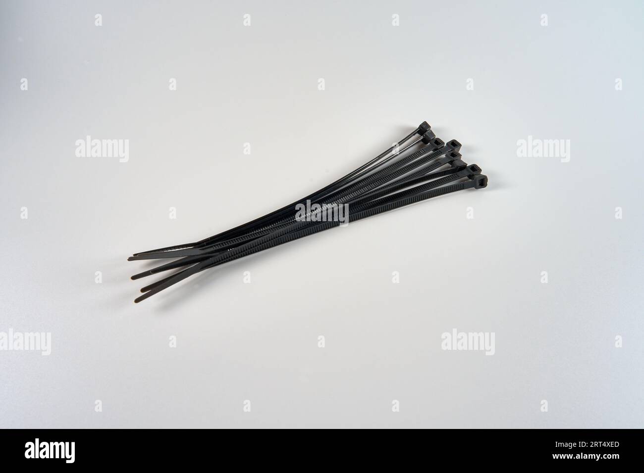 Eight zip ties on a white background Stock Photo