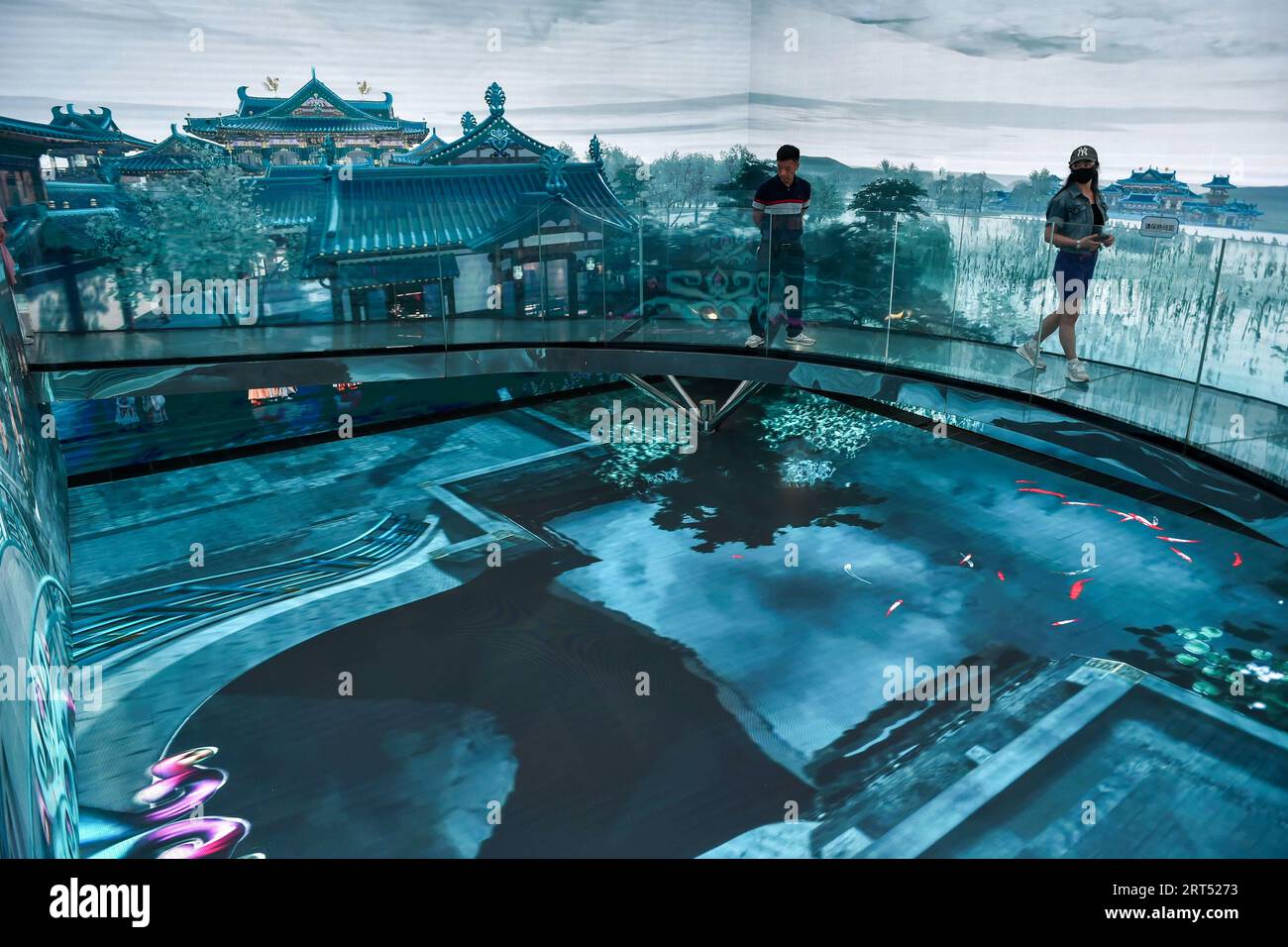 NANJING, CHINA - SEPTEMBER 10, 2023 - Tourists view a panoramic animation at a digital exhibition hall in Jinling town in Nanjing, East China's Jiangs Stock Photo