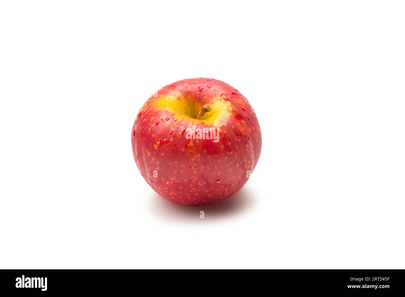 Single perfect fresh organic Ambrosia apple with water drop and leaf on