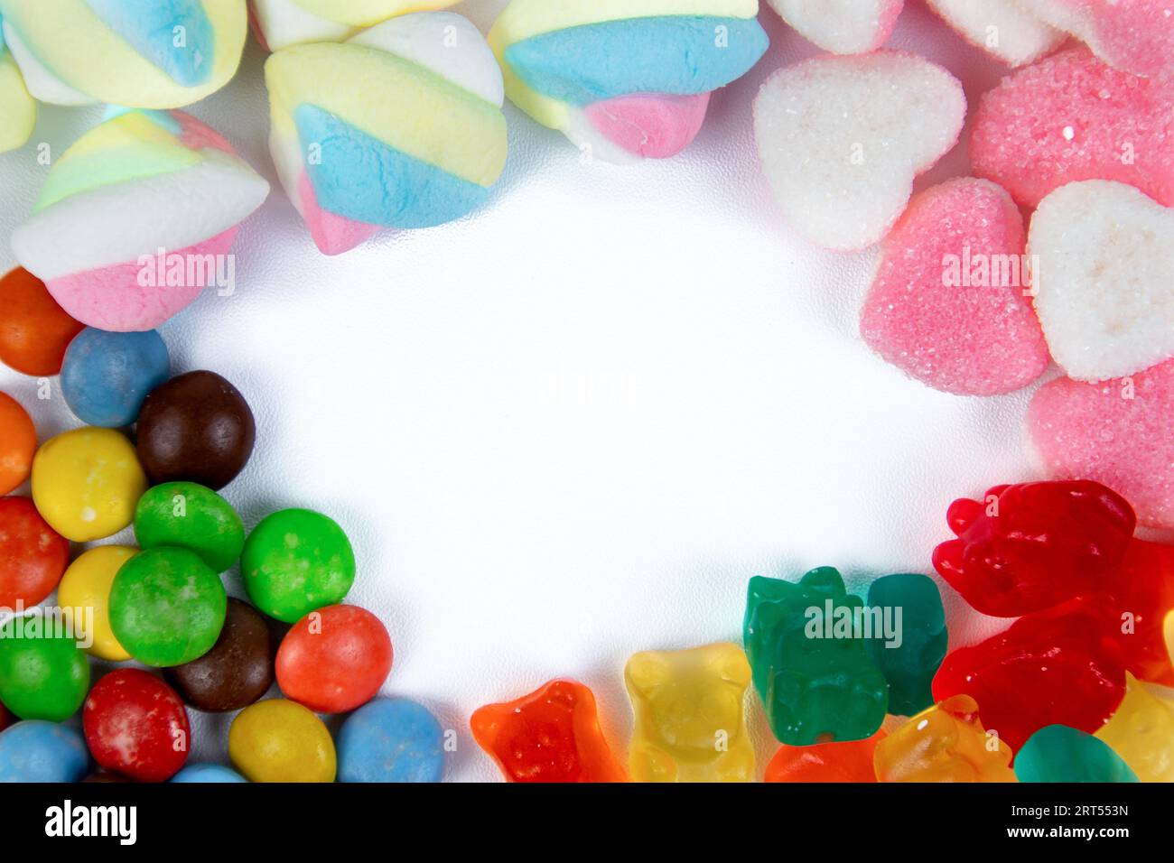 frame of candies on white background Stock Photo - Alamy