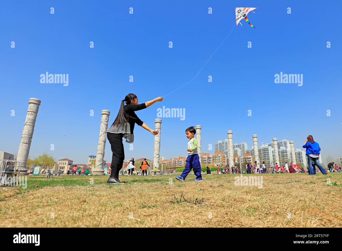 Luannan County - April 15, 2017: people fly kites in the open air, Luannan County, Hebei Province, China, April 15, 2017 Stock Photo