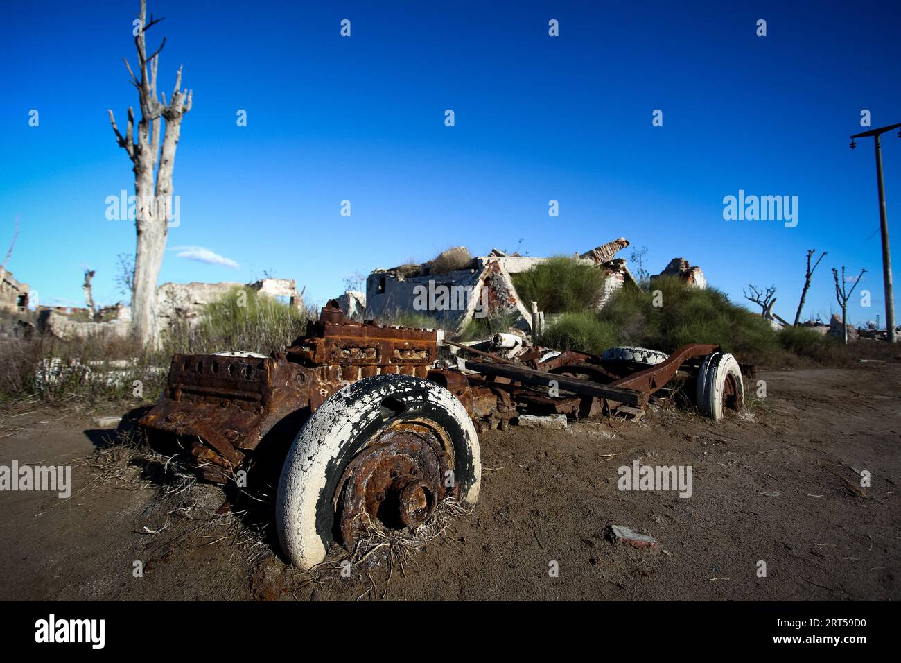Epecuen, Buenos Aires, Argentina. 23rd Aug, 2023. Old car abandoned in the ruins of Epecuen. Epecuen is the name of a ruinous Argentine tourist town, located 7 km from Carhue, in the district of Adolfo Alsina, province of Buenos Aires. The city was founded in 1921 on the shores of the lake of the same name, it had around 1,500 habitants and was visited by an average of 25,000 tourists during the summer.Its waters are attributed healing properties due to the high level of salinity, which was a tourist attraction in those years. In 1985, a flood caused by the flooding of the lake left the to Stock Photo