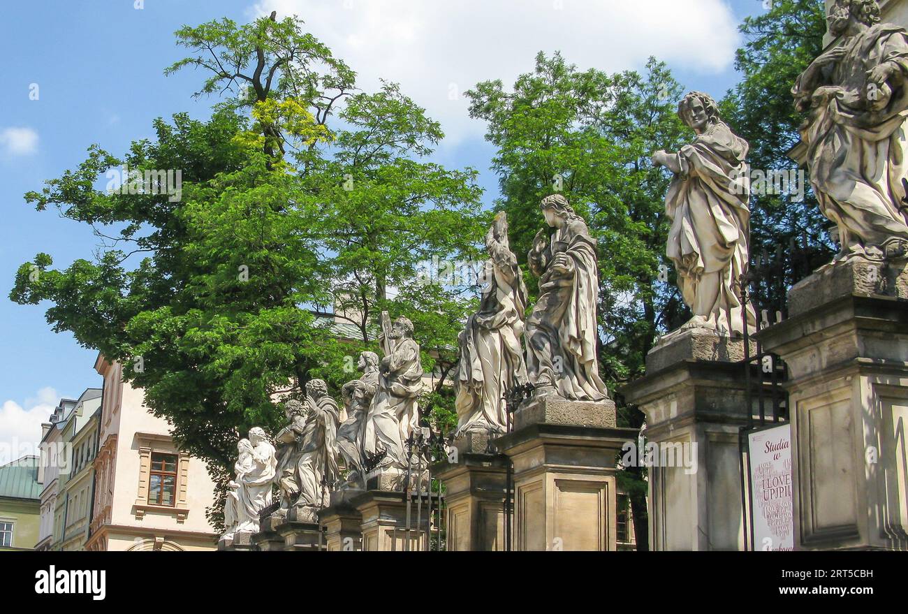 sculptures in front of Church of St. Peter and St. Paul, Krakow, Poland Stock Photo