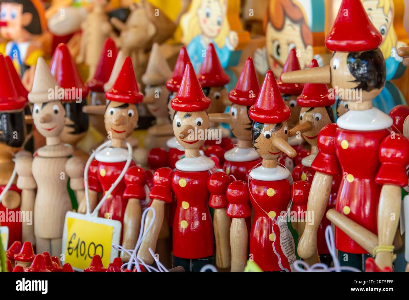 Wooden figurines depicting the character of Pinocchio in Collodi, Italy Stock Photo