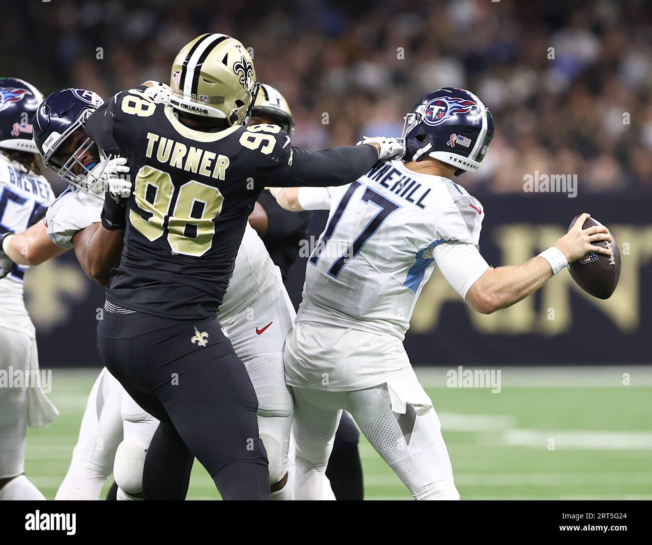 New Orleans, USA. 10th Sep, 2023. Tennessee Titans quarterback Ryan  Tannehill (17) attempts a pass against an outstretched New Orleans Saints  defensive end Payton Turner (98) during a National Football League game