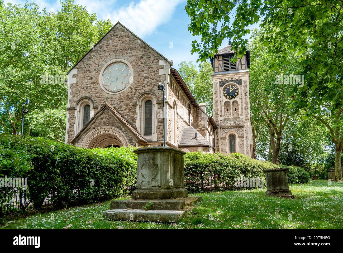 The church of St Pancras, in St Pancras Old Church Cemetery, nestled in the trees, London Borough of Camden, United Kingdom Stock Photo