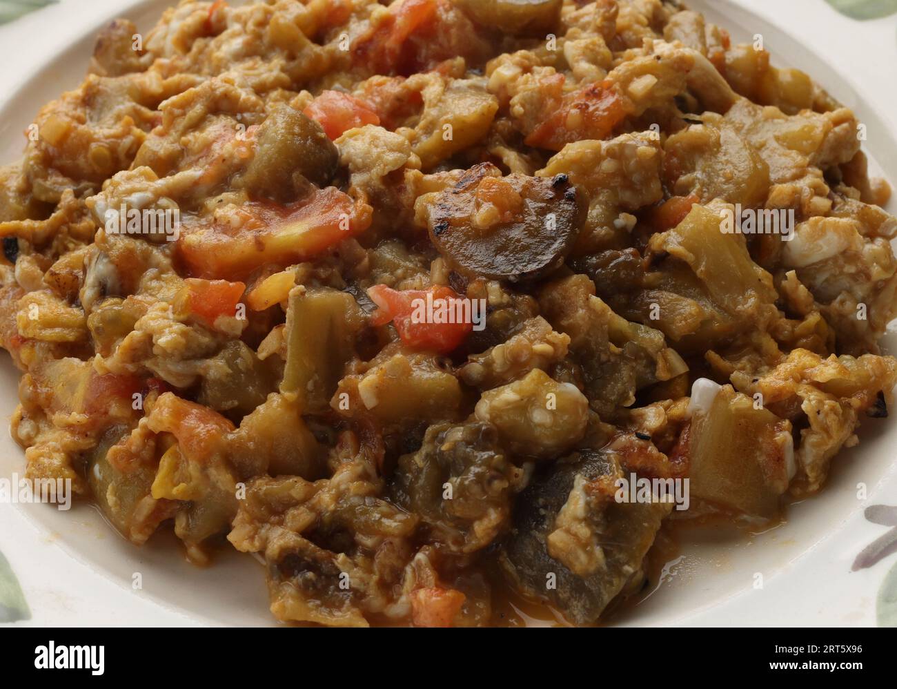 A picture shows a dish of Mirza Ghasemi, an authentic Iranian eggplant