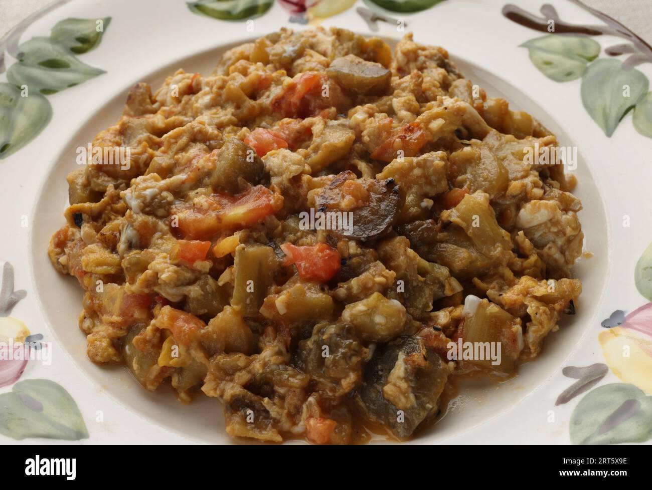 A picture shows a dish of Mirza Ghasemi, an authentic Iranian eggplant