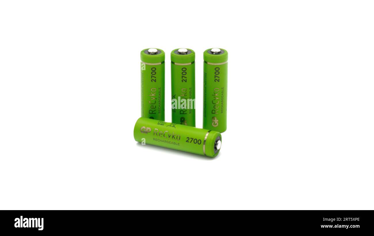 Four green rechargeable batteries on white background Stock Photo