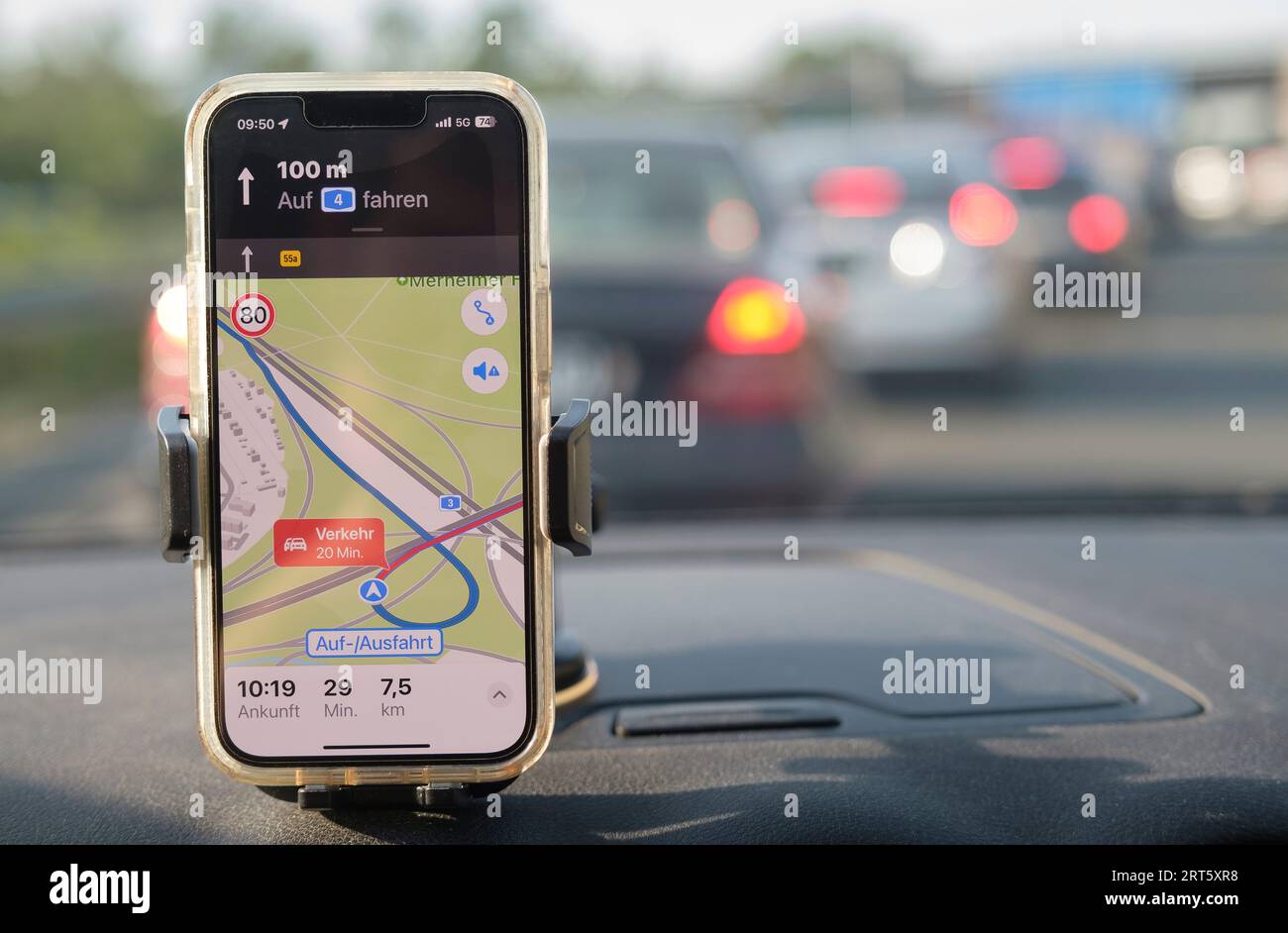 Mobile phone shows traffic jam on the motorway Stock Photo