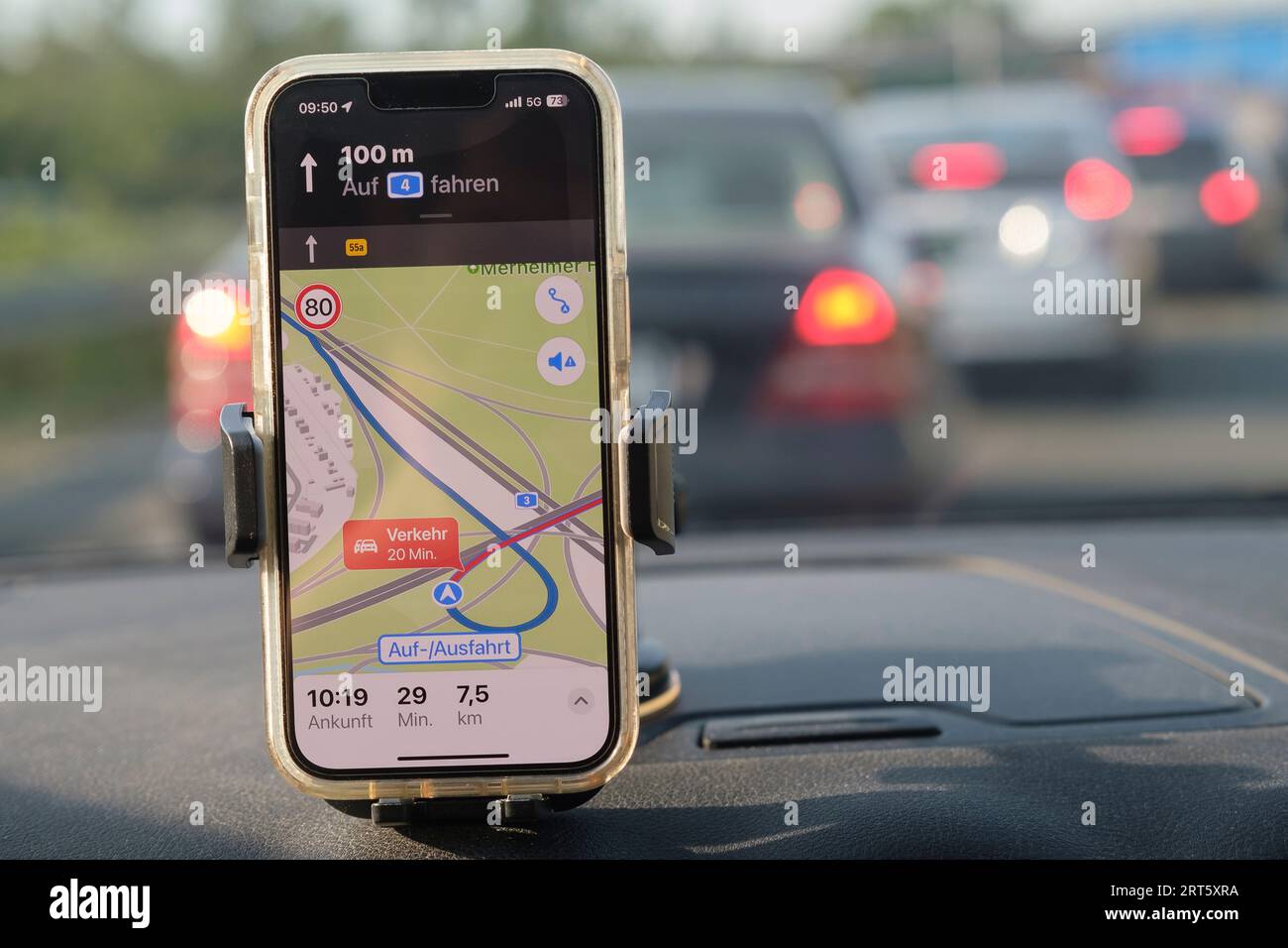 Mobile phone shows traffic jam on the motorway Stock Photo