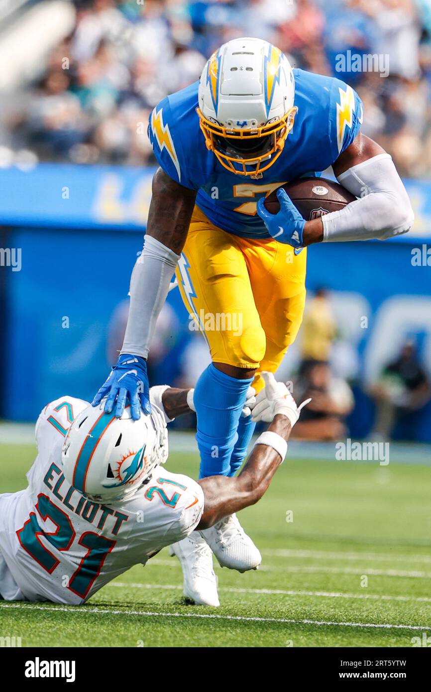 Buffalo Bills vs. Miami Dolphins. NFL Game. American Football League match.  Silhouette of professional player celebrate touch down. Screen in backgrou  Stock Photo - Alamy