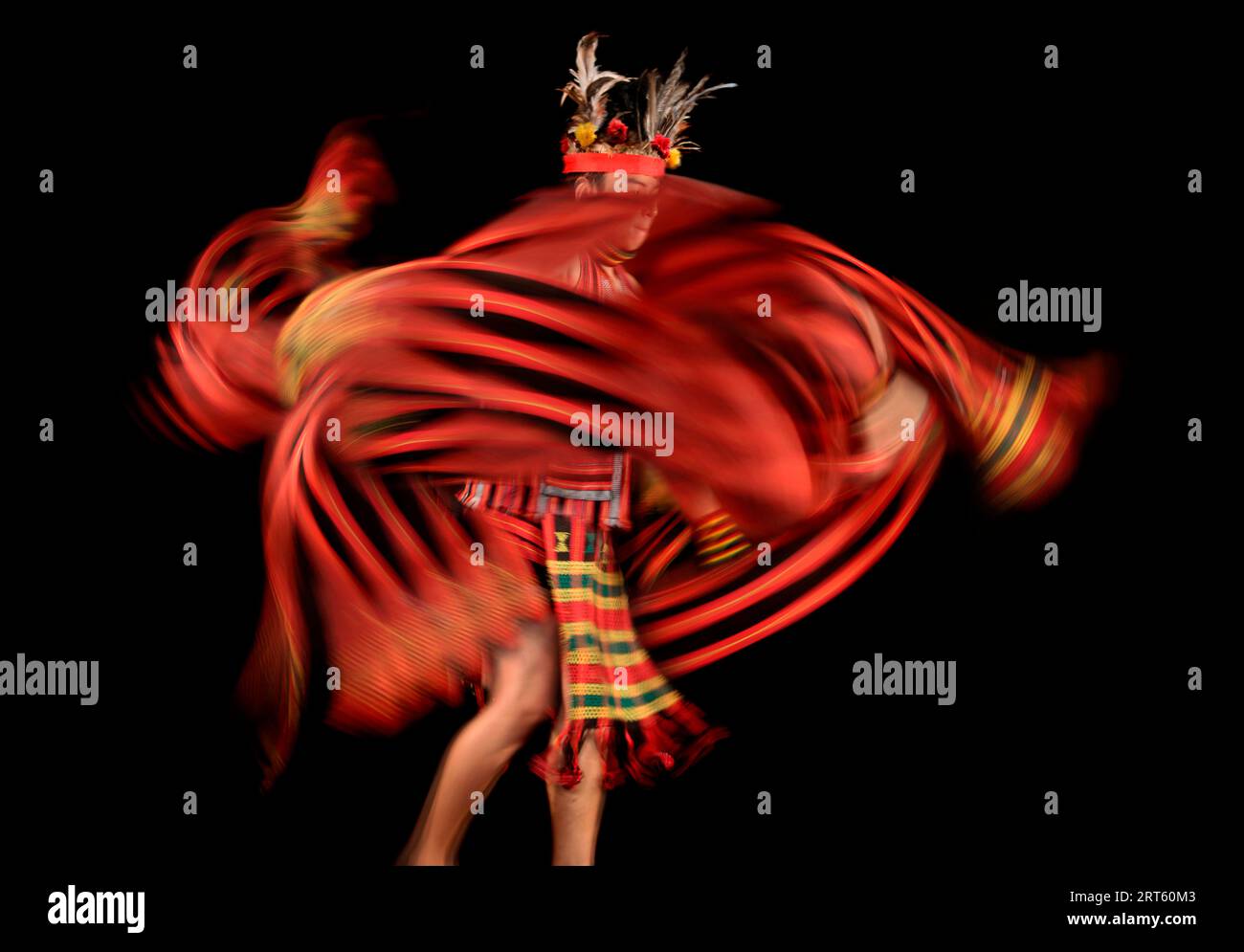 Ifugao tribesman dancing against black background, Banaue, Ifugao, Philippines Stock Photo