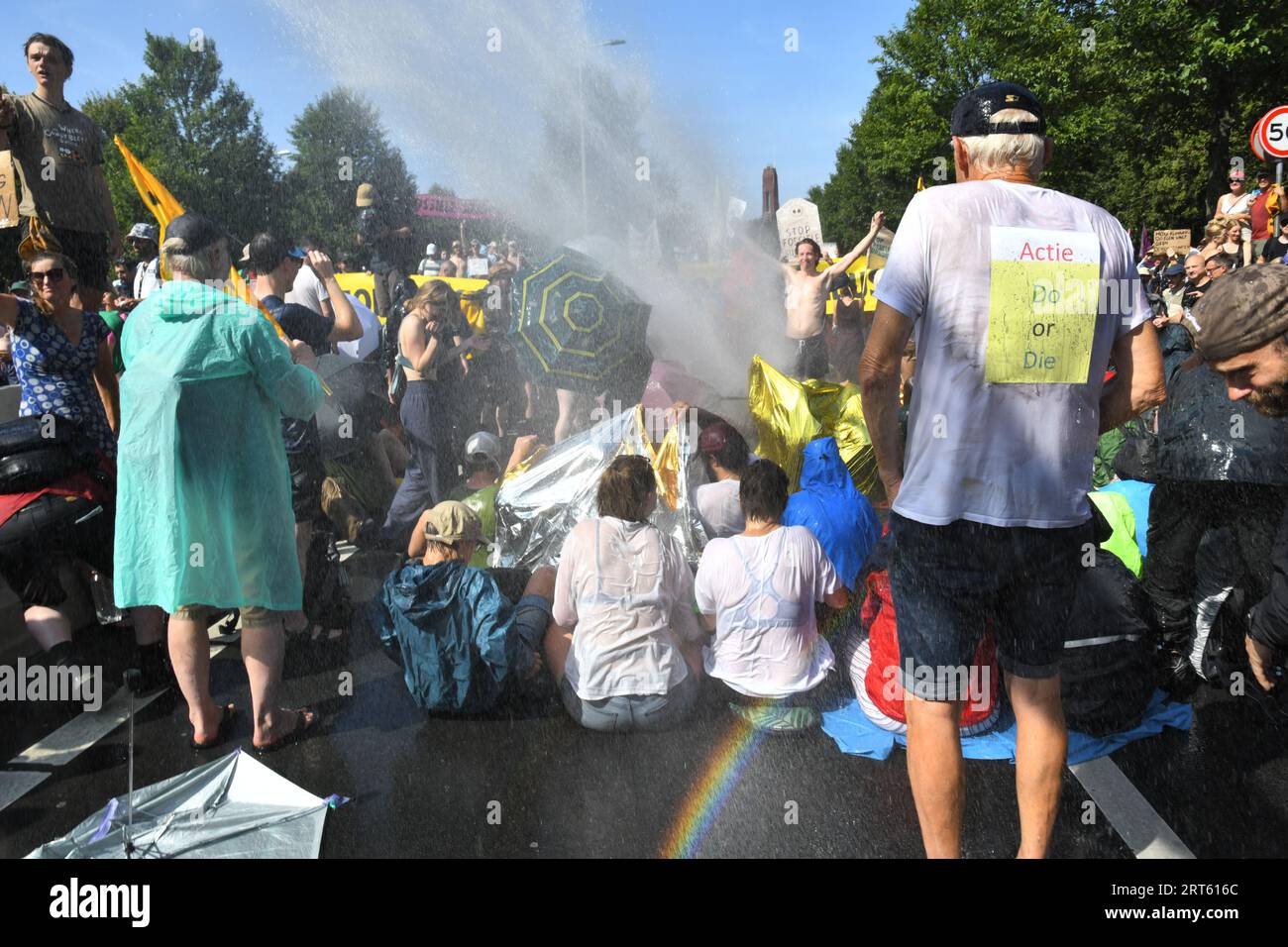 The Hague,The Netherlands, 9th september,2023. For the 8th time thousands of Extinction rebellion activists protested against fossil fuels subsidies by blocking the A12 motorway. Watercannons were used and police removed and arrested hundreds of people. Stock Photo