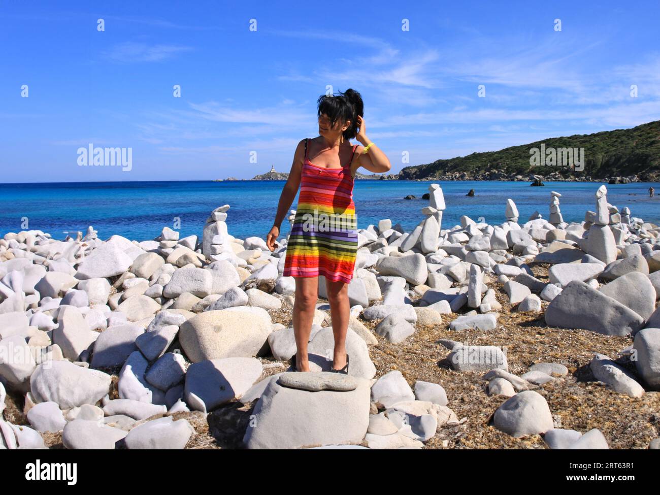 old woman in bikini on the rocks Stock Photo Alamy