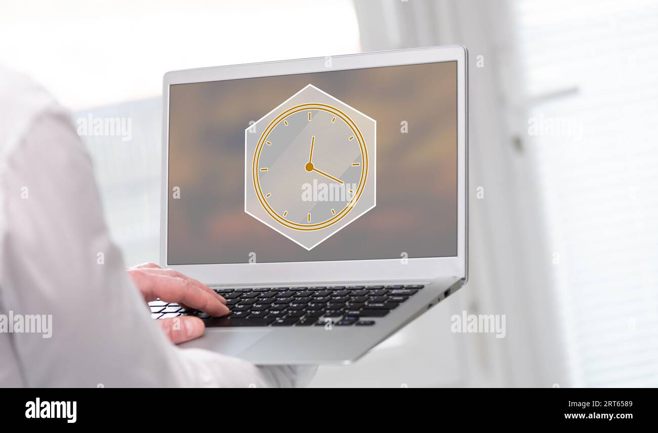 Laptop screen displaying a time management concept Stock Photo - Alamy