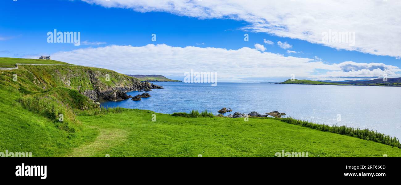 Scotland Shetland scenery in England with cliffs, ocean views and green pastures. Stock Photo