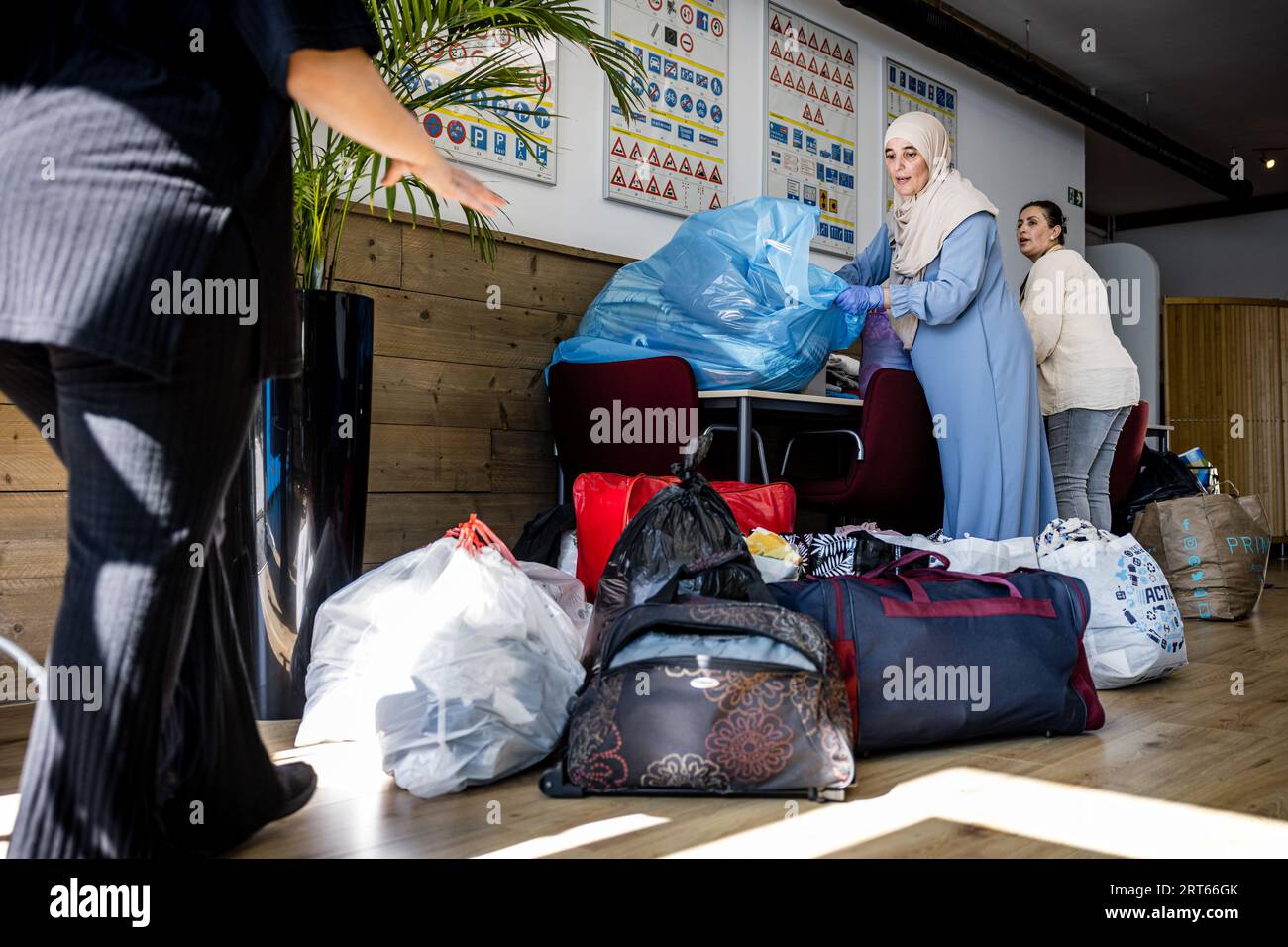 EINDHOVEN - Local residents bring items to a collection point for the  victims of the earthquake in Morocco. ANP ROB ENGELAAR netherlands out -  belgium out Stock Photo - Alamy