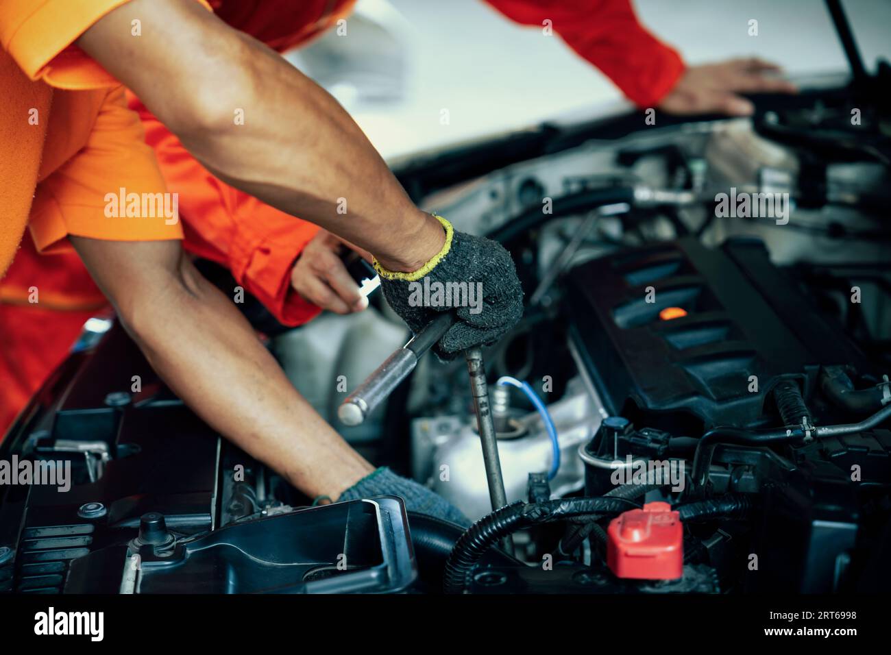 Automotive service mechanic inspect and diagnose car engine issue