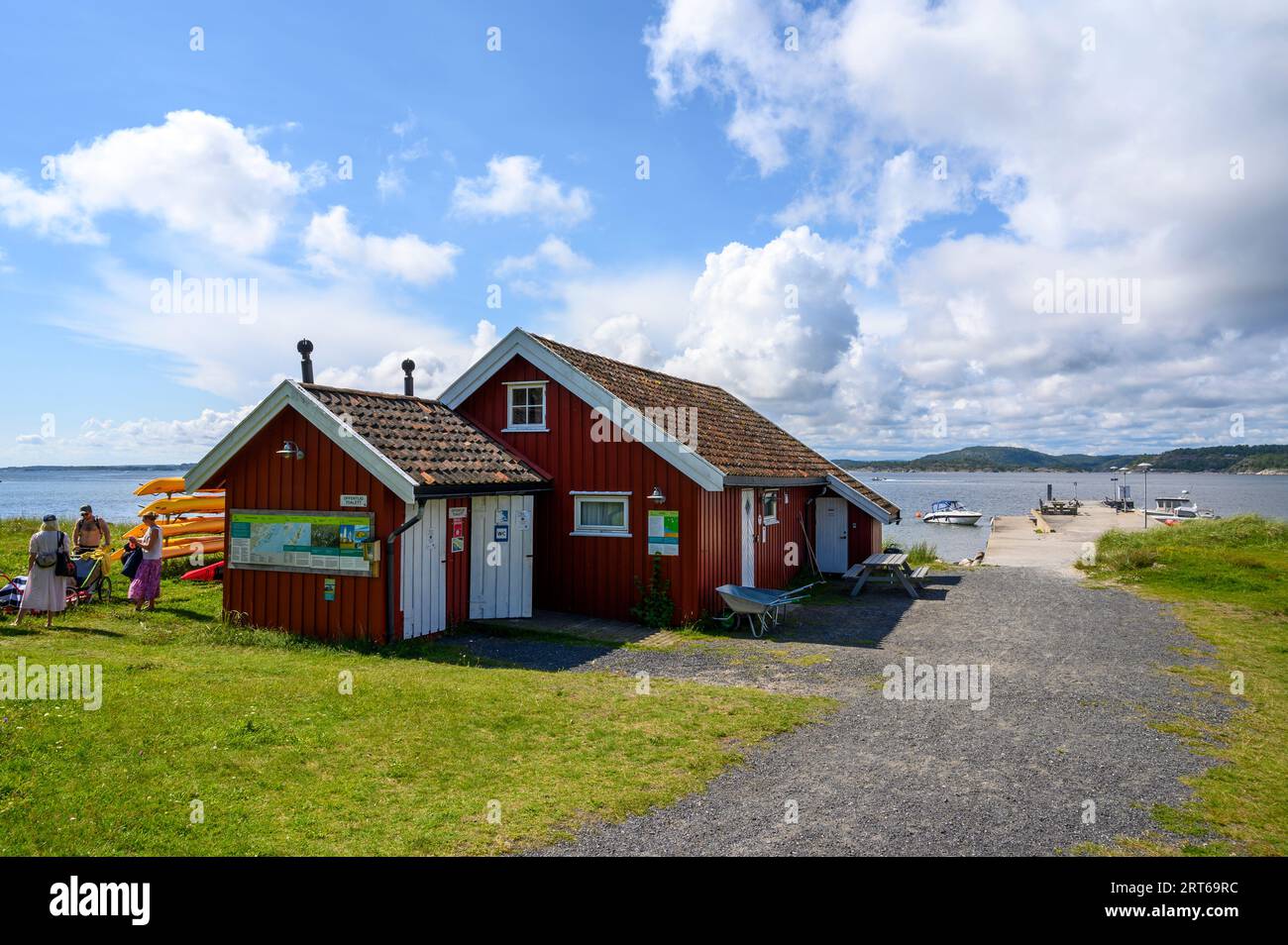 Øitangen on Jomfruland is a group of accommodation cabins and services run by The Norwegian Trekking Association for visitors to the island. Norway. Stock Photo