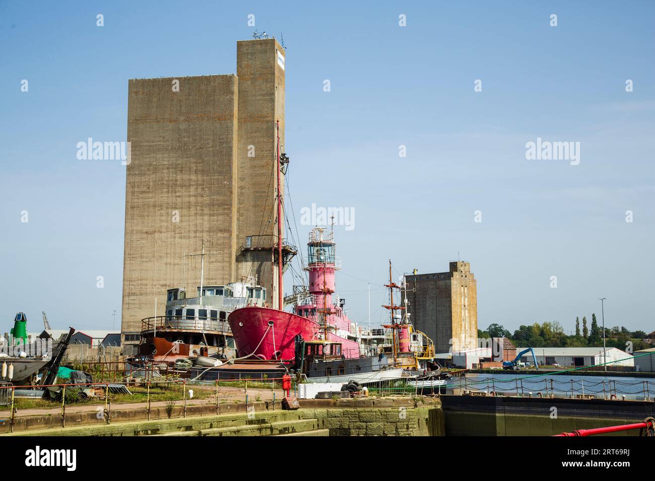 Sharpness dock and shipyard, with silo and derelict ships Stock Photo