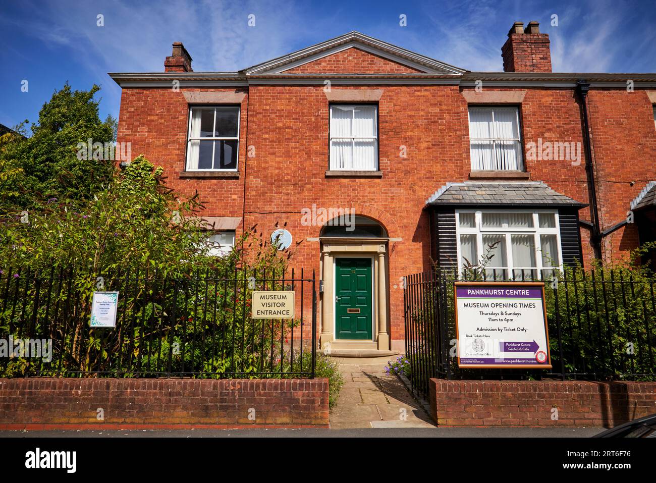 The Pankhurst Centre in the grounds of MRI Emmeline Pankhurst blue plaque on the centre building Stock Photo
