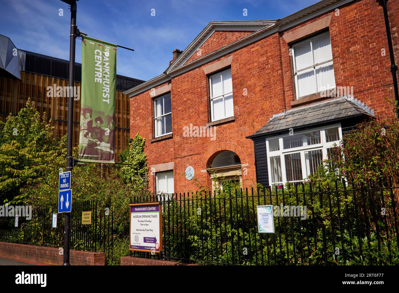 The Pankhurst Centre in the grounds of MRI Emmeline Pankhurst blue plaque on the centre building Stock Photo