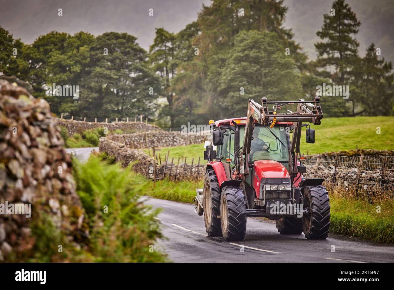 tractor in the road at  Borrowdale in Longthwaite, Keswick Lake District Stock Photo