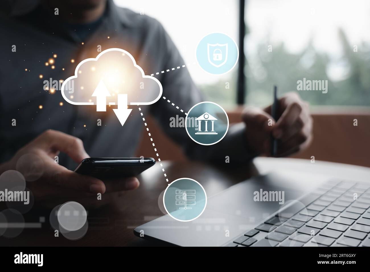 Virtual screen with cloud computing diagram displayed by a man Stock Photo