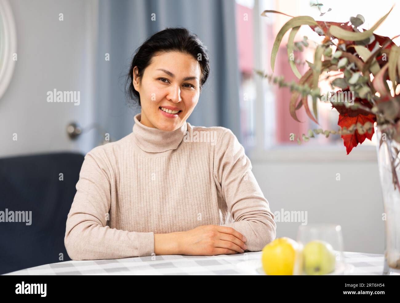Positive asian lady sitting hi-res stock photography and images - Alamy