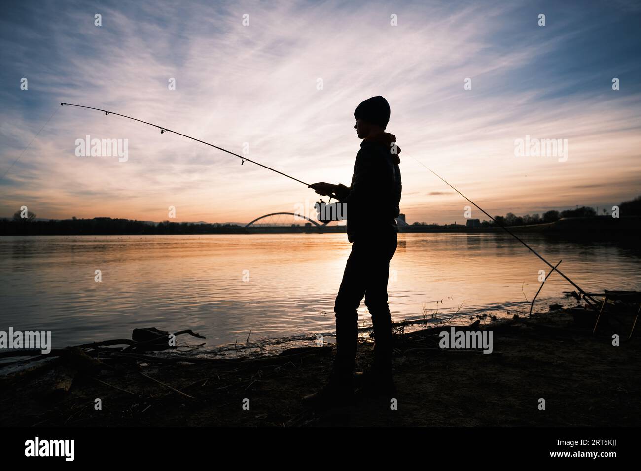 Teenage boy fishing river hi-res stock photography and images