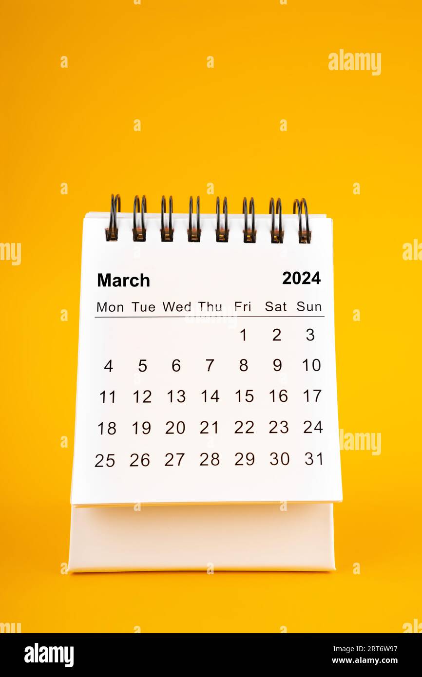 White clean March desk calendar for 2024 year on yellow background