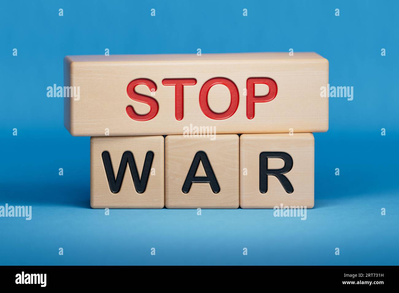 STOP WAR symbol. Wooden blocks with words 'STOP WAR'. wooden cubes with the inscription STOP WAR.3D rendering on blue background. Wooden cube blocks. Stock Photo