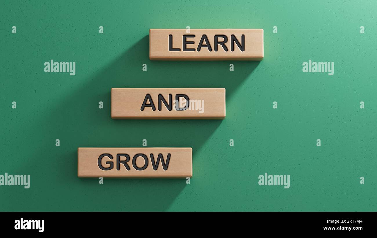 Learn and grow symbol. Concept words Learn and grow on wooden blocks.Business and Learn and grow concept. Copy space.3D rendering on green background. Stock Photo