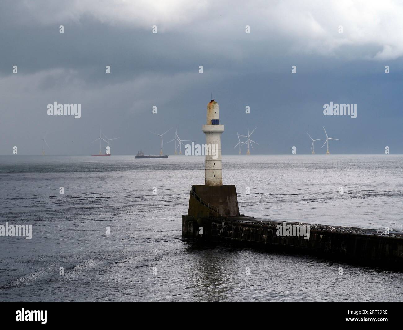 Lighthouse on south breakwater, Aberdeen harbour, Scotland Stock Photo