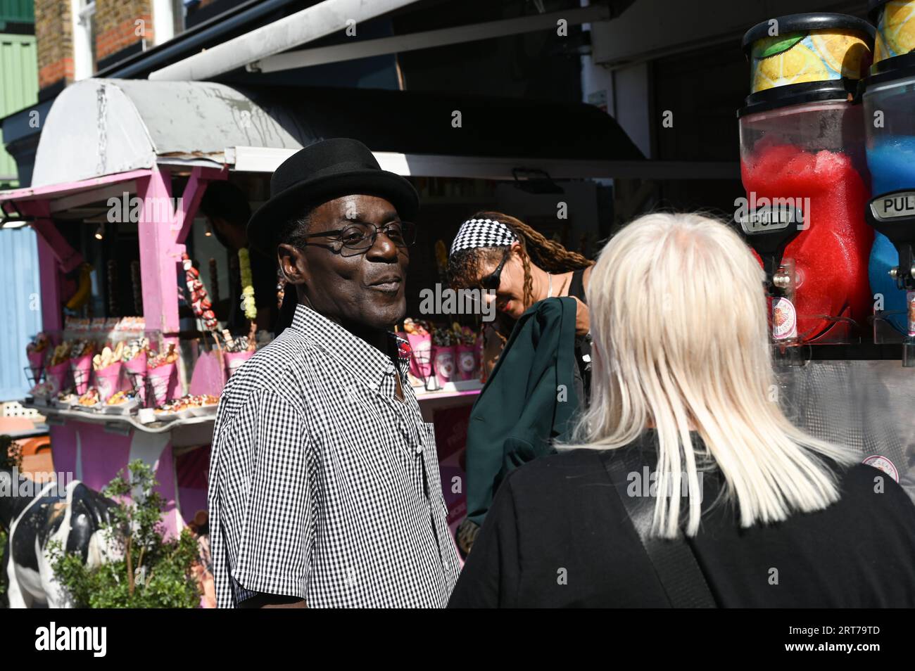 Camden Town, London, UK. 9th Sep, 2023. Neville Staple and his wife browsing at a store in Camden at Shalamar, The Music Walk of Fame - Camden Music Festival, London, UK. Credit: See Li/Picture Capital/Alamy Live News Stock Photo