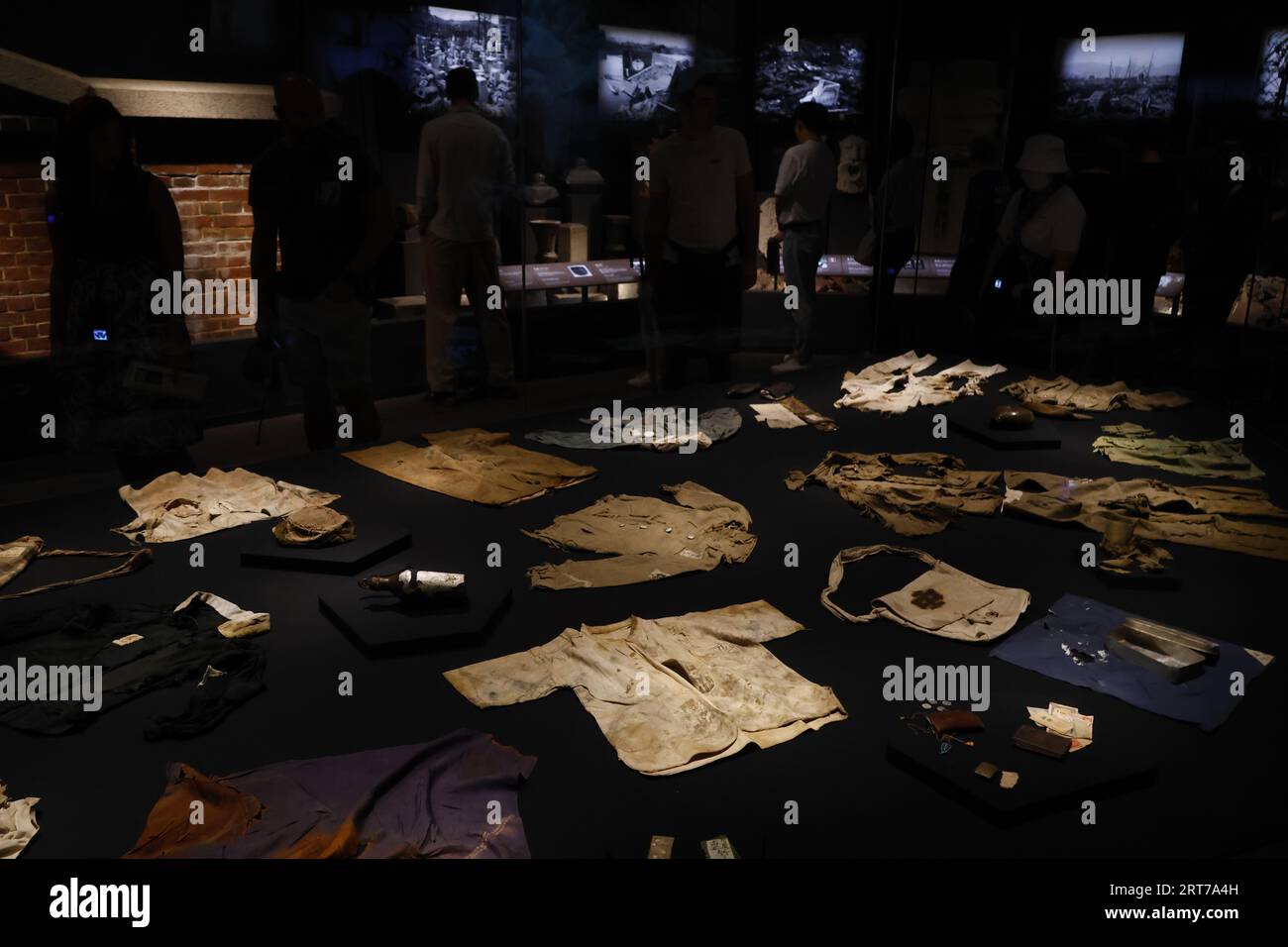 Photographs depicting the aftermath of the bombing, scale models of the ...