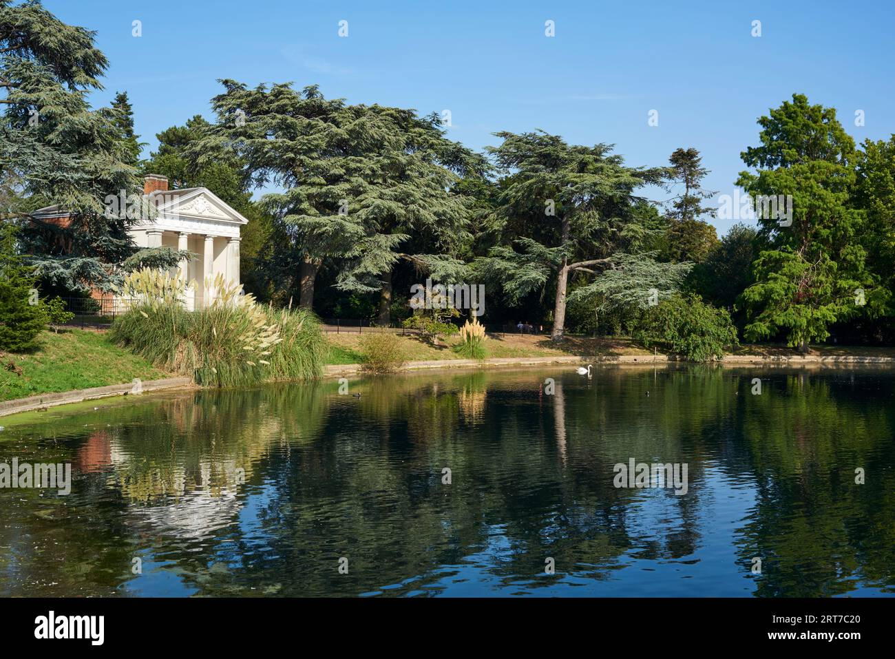 Gunnersbury Park, West London UK, in late summer, with the Round Pond and 18th century Doric temple Stock Photo