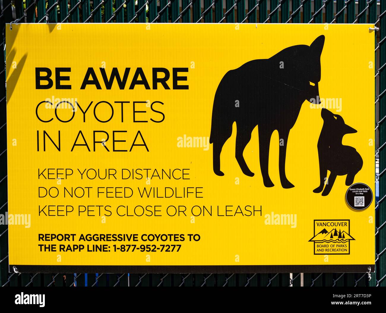 Coyote warning sign at Queen Elizabeth Park, Vancouver, BC, Canada. Stock Photo