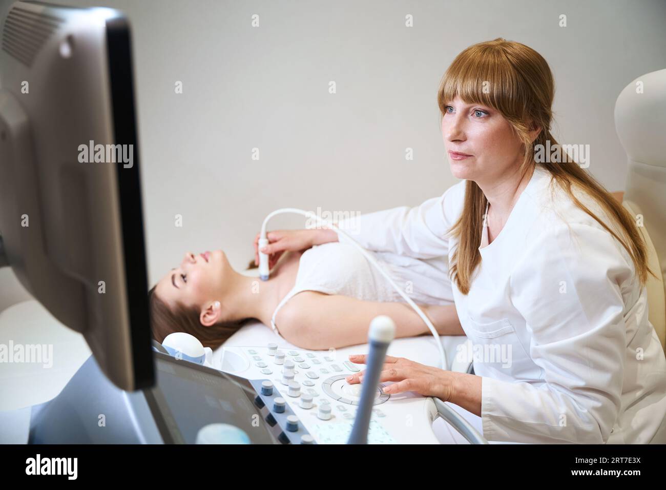 Specialist works on ultrasound device hi-res stock photography and ...