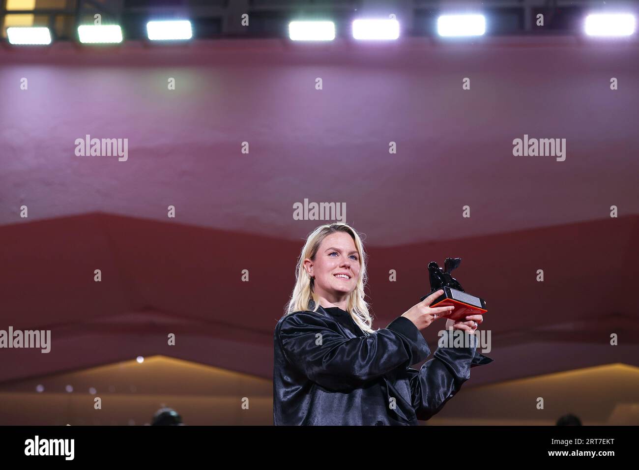 VENICE, ITALY - Sep 09: Mika Gustafson poses with the Best Director Award for film 'Paradise Is Burning' at the winner's photocall at the 80th Venice International Film Festival on September 09, 2023 in Venice, Italy.. (Photo by Mark Cape/Insidefoto) Stock Photo