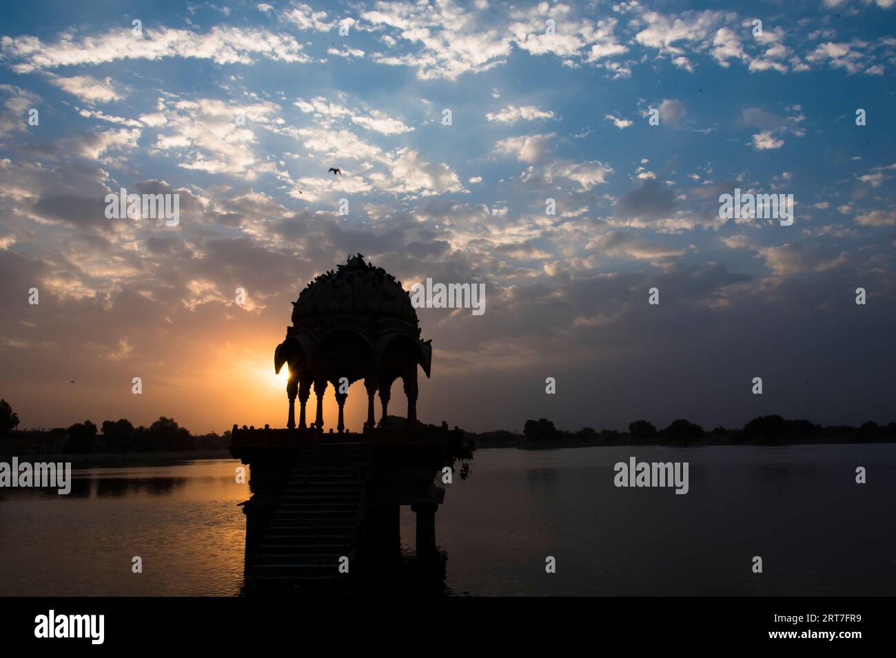 Sunrise at popular tourist destination Gadisar lake in Jaisalmer, Rajasthan, India. Stock Photo