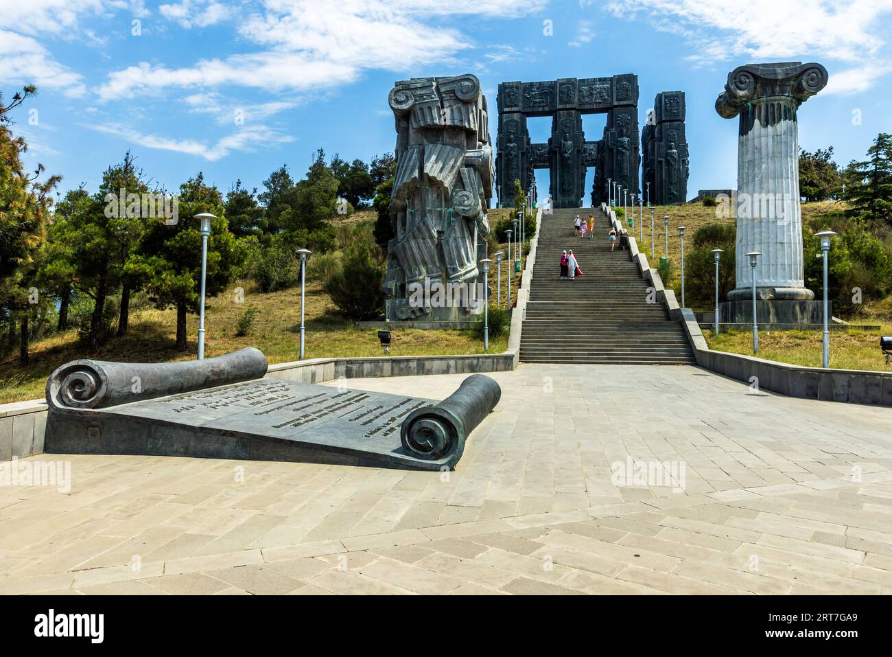 The Chronicle of Georgia is a monument visible from afar on Mount Kenisi near Tbilisi, the capital of Georgia. Created in 1985 by sculptor Zurab Zereteli, it is dedicated to the 3,000th anniversary of the state of Georgia and the 2,000th anniversary of Georgia's Christianization. It is little visited by tourists and locals alike Stock Photo