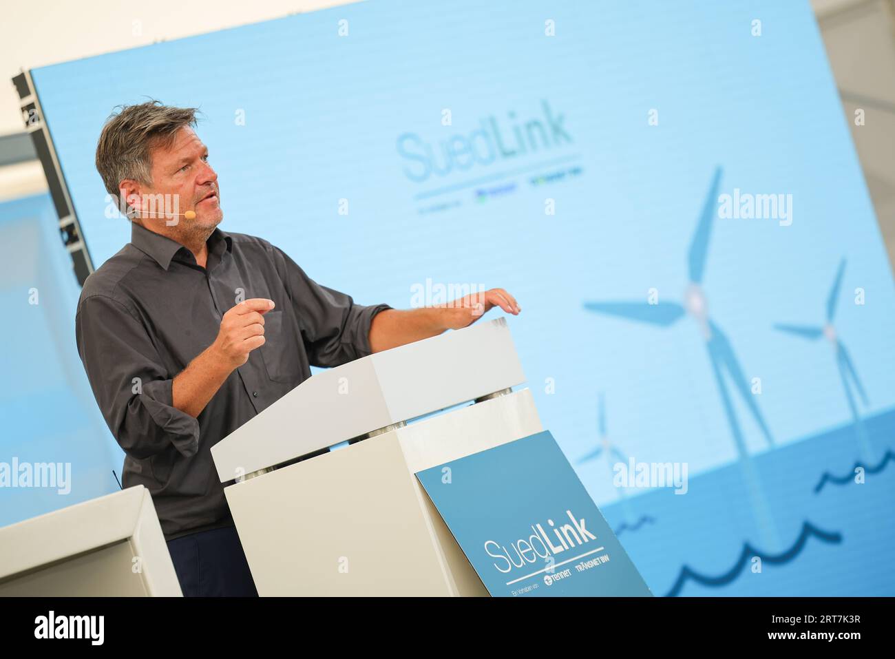 Wewelsfleth, Germany. 11th Sep, 2023. Robert Habeck (Bündnis 90/Die Grünen), Vice Chancellor and Federal Minister for Economic Affairs and Climate Protection, speaks at a press event to mark the official groundbreaking of the 'Suedlink' electricity transmission project. According to Tennet, the Suedlink route is 700 kilometers long and will cost around ten billion euros, making it the largest infrastructure project of the energy transition in Germany. Credit: Christian Charisius/dpa/Alamy Live News Stock Photo