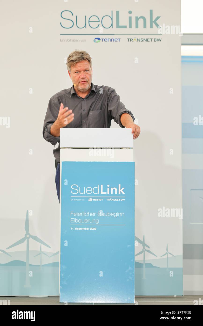 Wewelsfleth, Germany. 11th Sep, 2023. Robert Habeck (Bündnis 90/Die Grünen), Vice Chancellor and Federal Minister for Economic Affairs and Climate Protection, speaks at a press event to mark the official groundbreaking of the 'Suedlink' electricity transmission project. According to Tennet, the Suedlink route is 700 kilometers long and will cost around ten billion euros, making it the largest infrastructure project of the energy transition in Germany. Credit: Christian Charisius/dpa/Alamy Live News Stock Photo